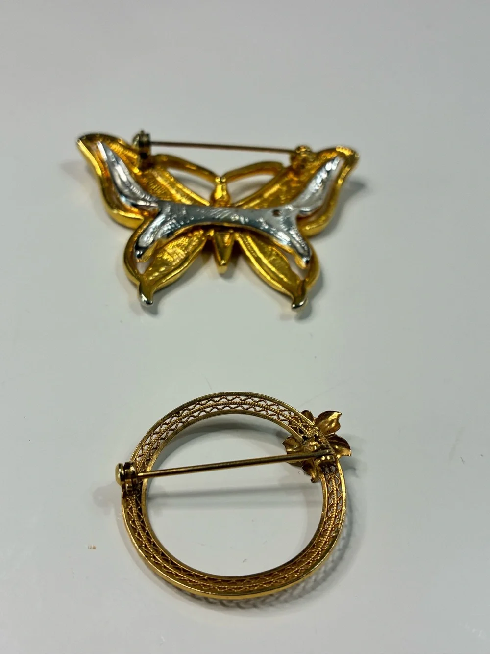 Two-Tone Gold and Silver Butterfly Brooch and Classic Infinity Floral Pin